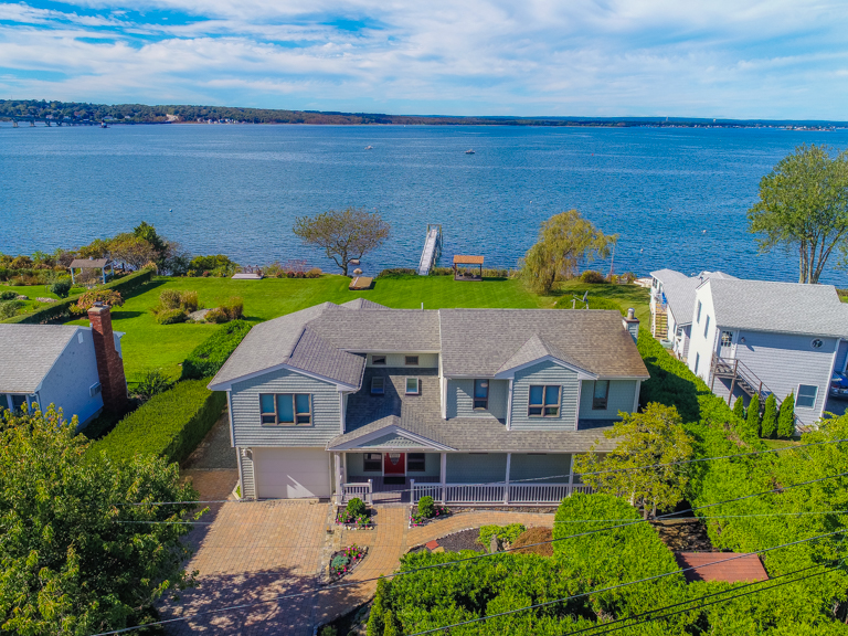 WATERFRONT CONTEMPORARY HOME WITH PRIVATE DOCK IN JAMESTOWN SHORES SELLS FOR $1.475M