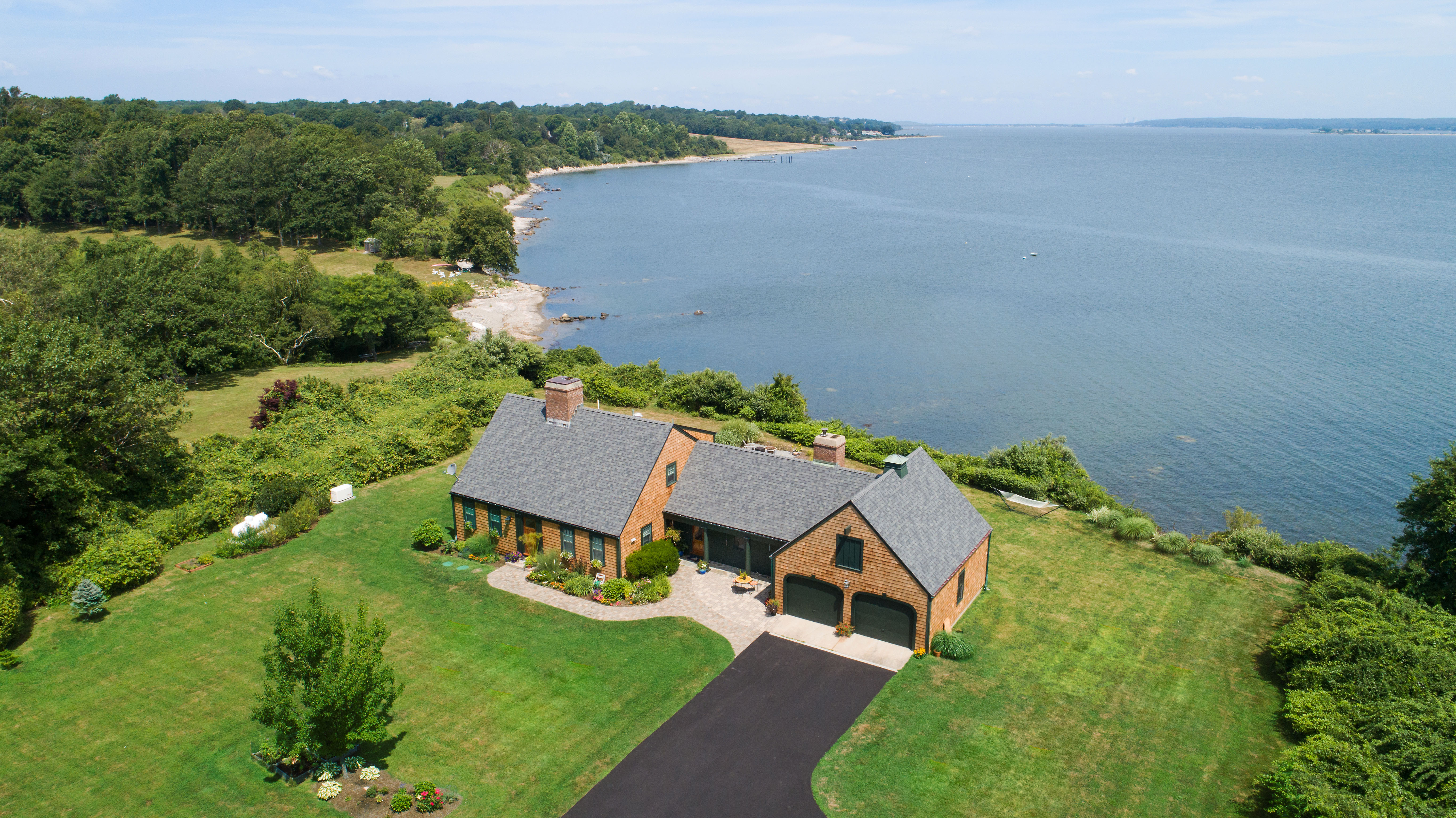 BLACK POINT WATERFRONT HOME SELLS FOR $1.745M,  MARKING A TOP SALE IN PORTSMOUTH*