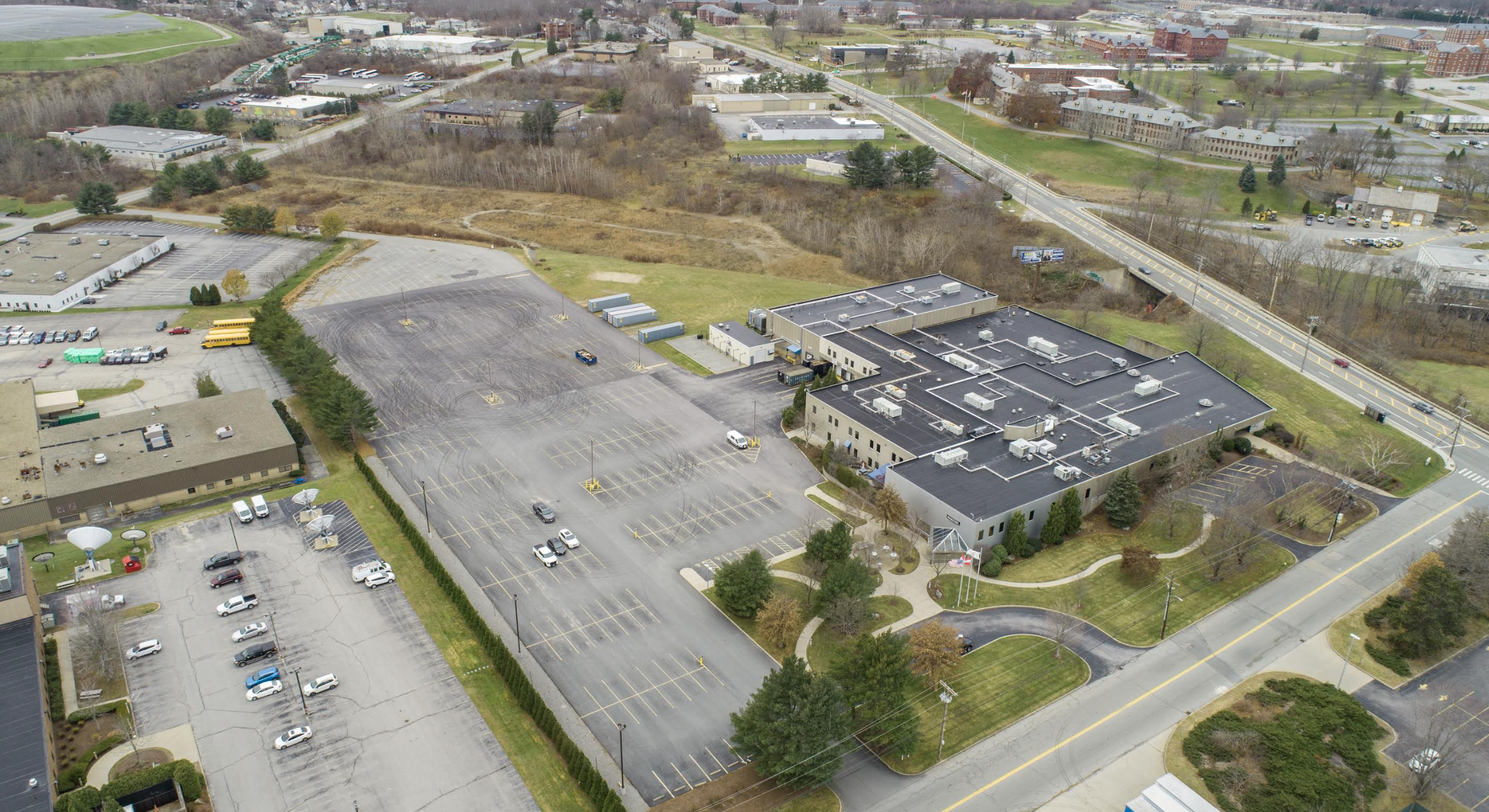 THE LOCAL GROUP OF LILA DELMAN COMPASS  BROKERS SALE OF GLOBAL COMMERCIAL BUILDING IN CRANSTON